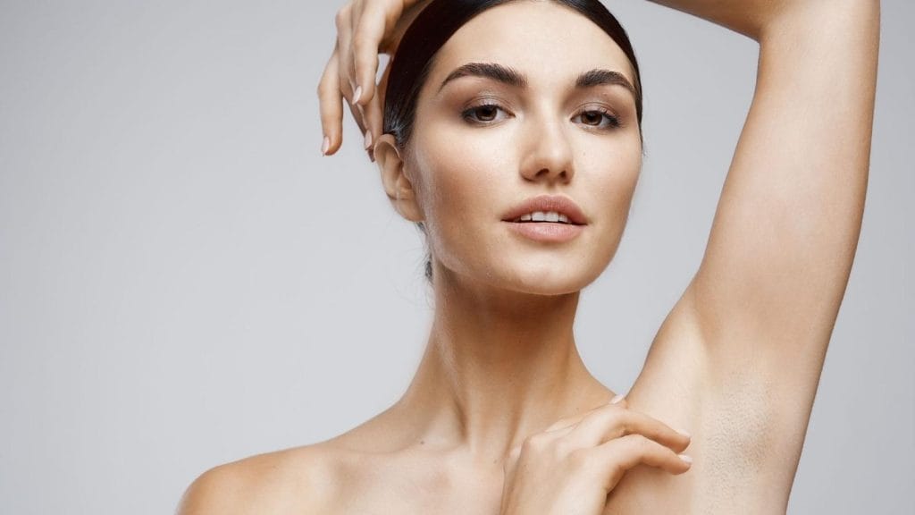 Female client with smooth skin after laser hair removal myths debunked
